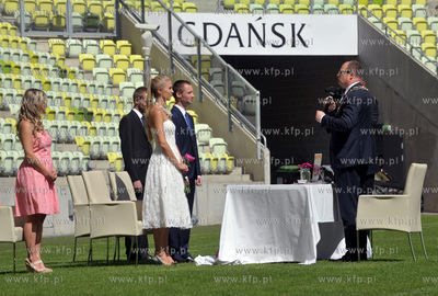 Slub na stadionie PGE Arena w Gdansku. Inga Szwarc...