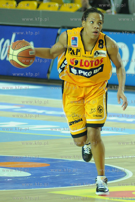 Monique Currie, (numer 8) czolowa zawodniczka zawodowej...