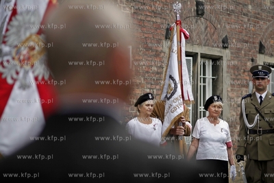 Odsloniecie tablicy upamietniajcej fakt, ze w budynku...