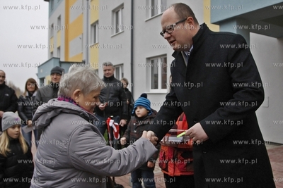 Uroczystosc przekazania mieszkan nowym lokatorom w...