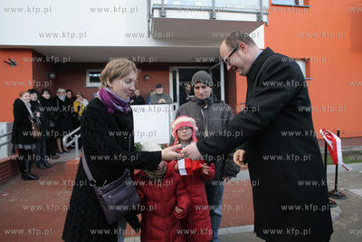 Uroczystosc przekazania kluczy nowym mieszkancom kamienic...