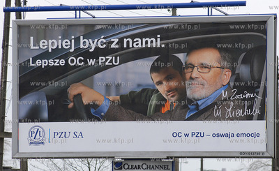 Gdynia, ul. Hutnicza. Bilboard reklamowy PZU z udzialem...