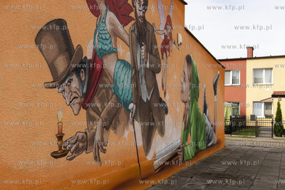 Bajkowy mural Marka "Looneya" Rybowskiego na ścianie...