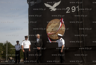 Port wojenny w Gdyni-Oksywiu. Wodowanie monety NBP...