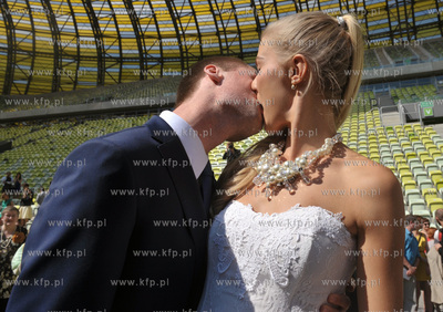 Slub na stadionie PGE Arena w Gdansku. Inga Szwarc...