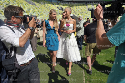 Slub na stadionie PGE Arena w Gdansku. Inga Szwarc...